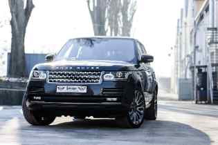 black land rover viewed from the front