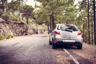 mazda 3 on the road - rear view
