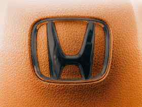 close up of a honda badge