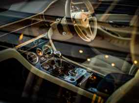 car dashboard seen through the car window