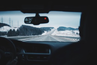 view from inside the car of a vehicle driving