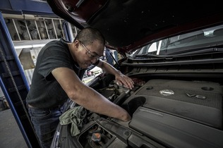 man working on an engine