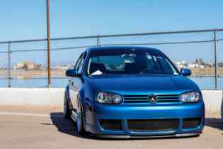 front view of a blue vw polo