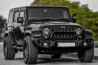 front and side view of a black jeep wrangler
