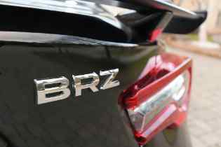 close up of a subaru brz badge