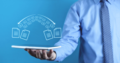 Close-up of a finger pressing a blue keyboard key labeled “transfer,” symbolizing the process of transferring a car warranty online.