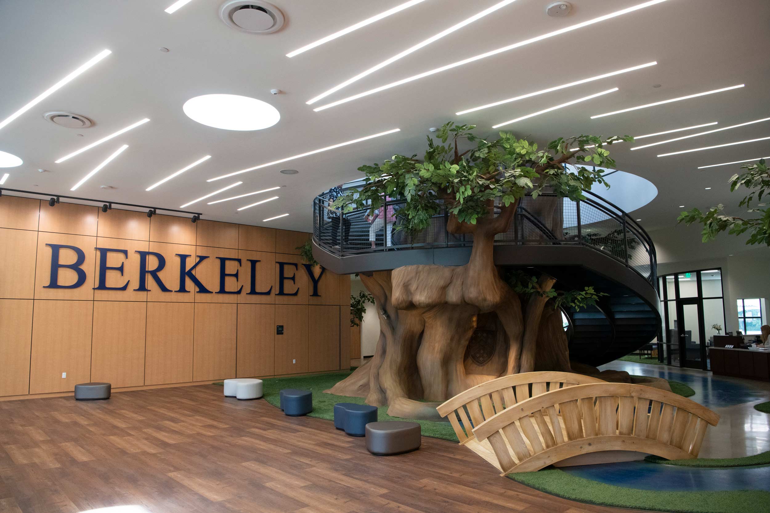 Interior of the Seivold Center; circular staircase wrapped around a fabricated tree