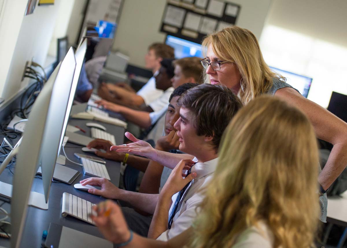 Teacher instructing visual arts