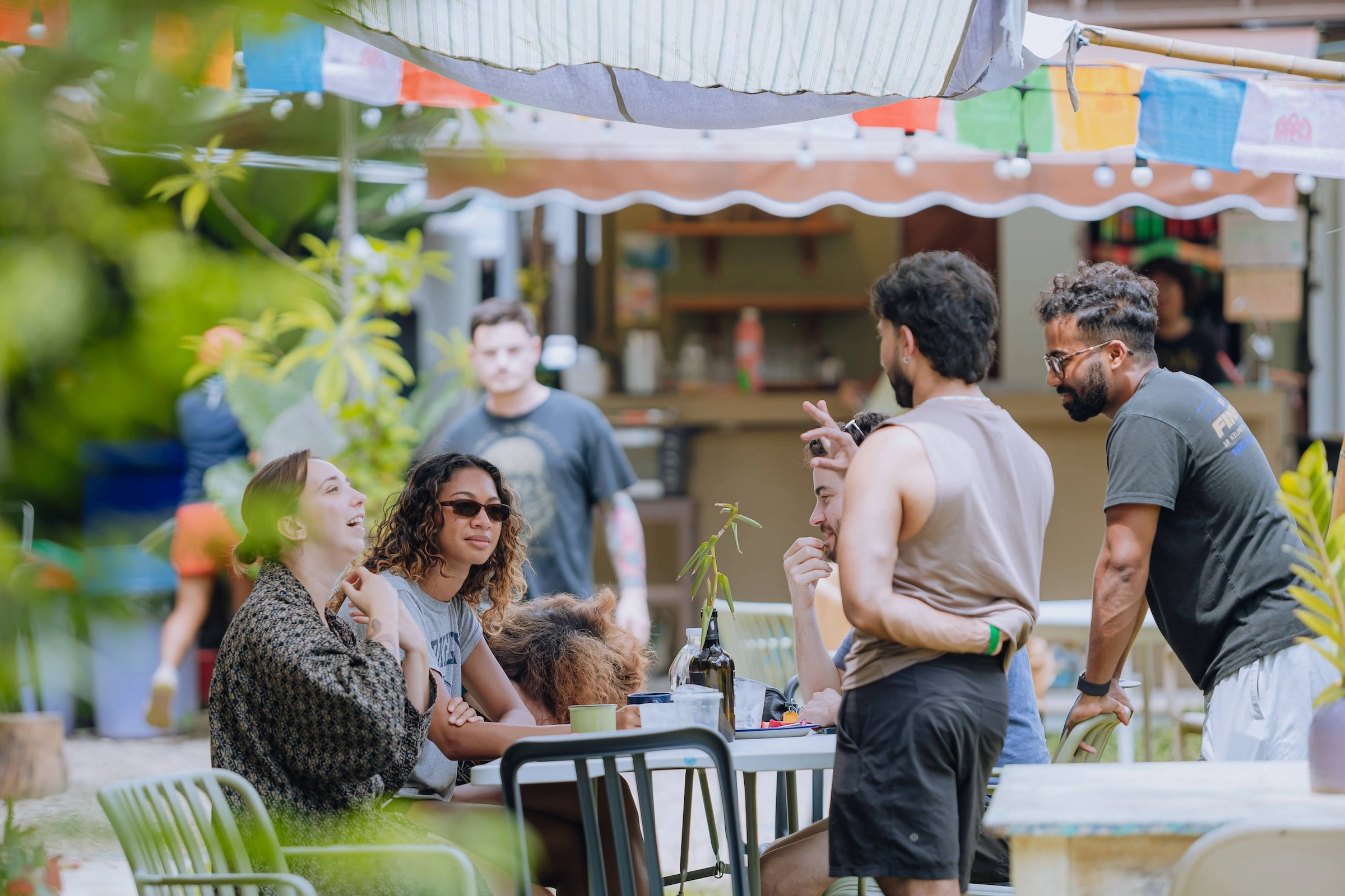 Guests chatting together at the Yard Chiang Mai