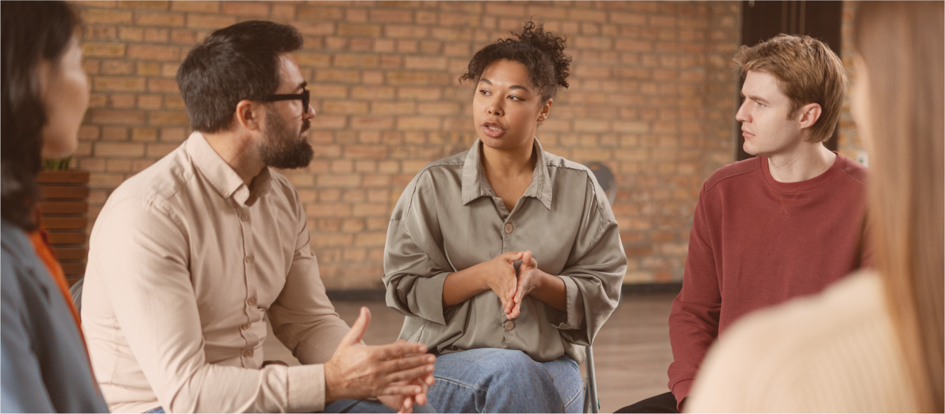 A diverse support group in a meeting