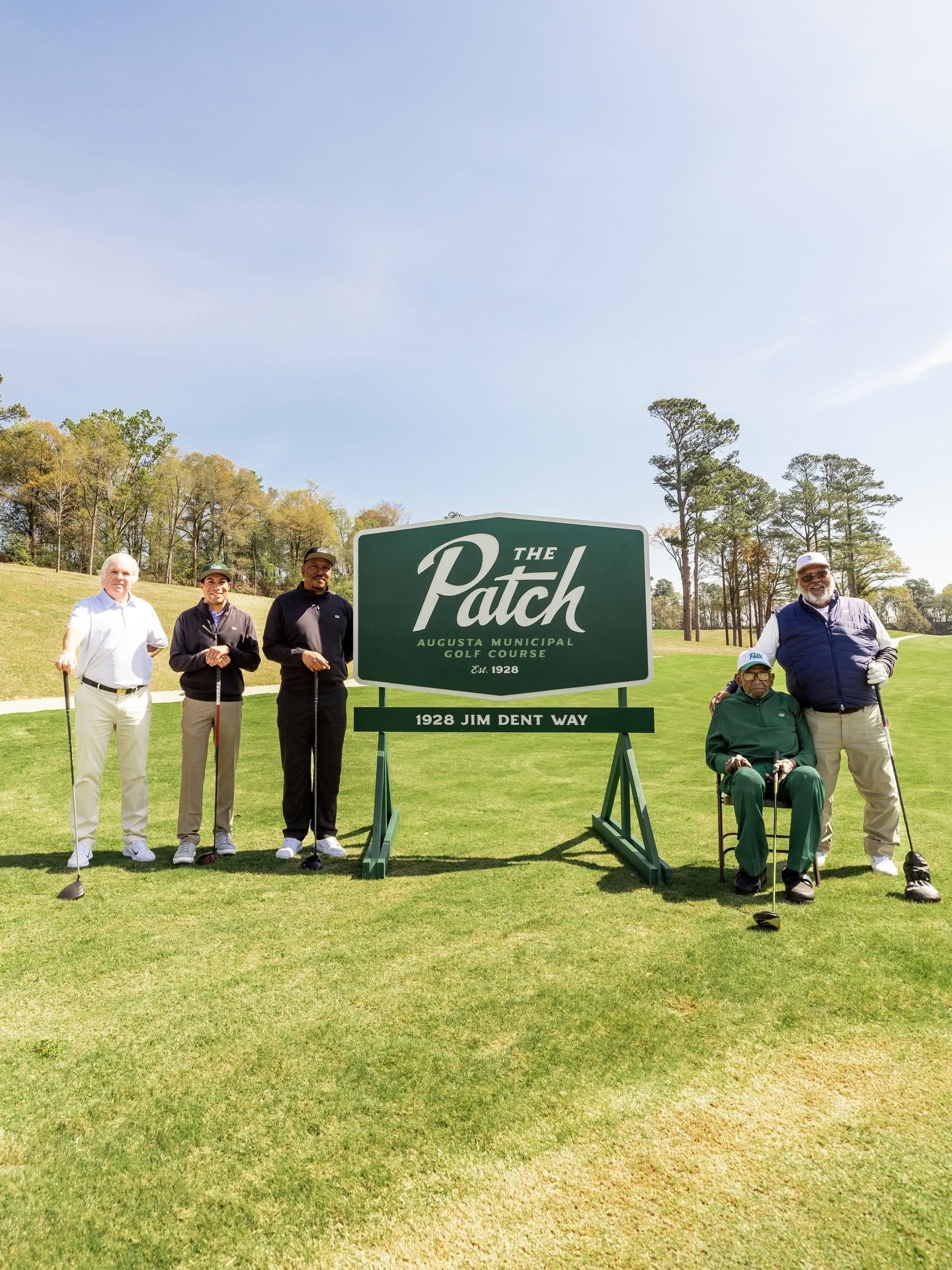 Clois Herndon, James and Josh Dent, Ike Choice, and Jim Douglas gather at The Patch during Community Day in Augusta, Georgia.