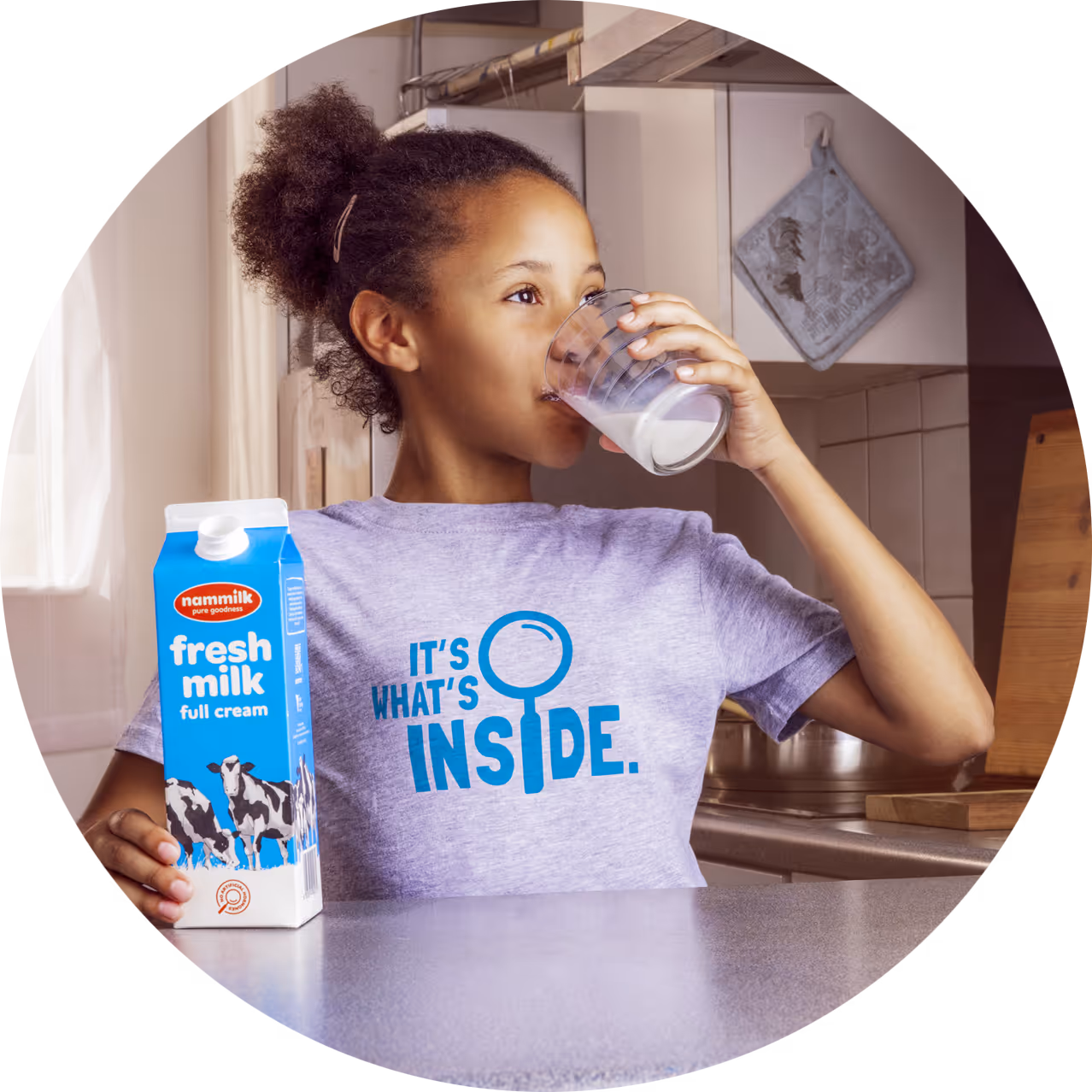 A girl drinking Nammilk Fresh milk