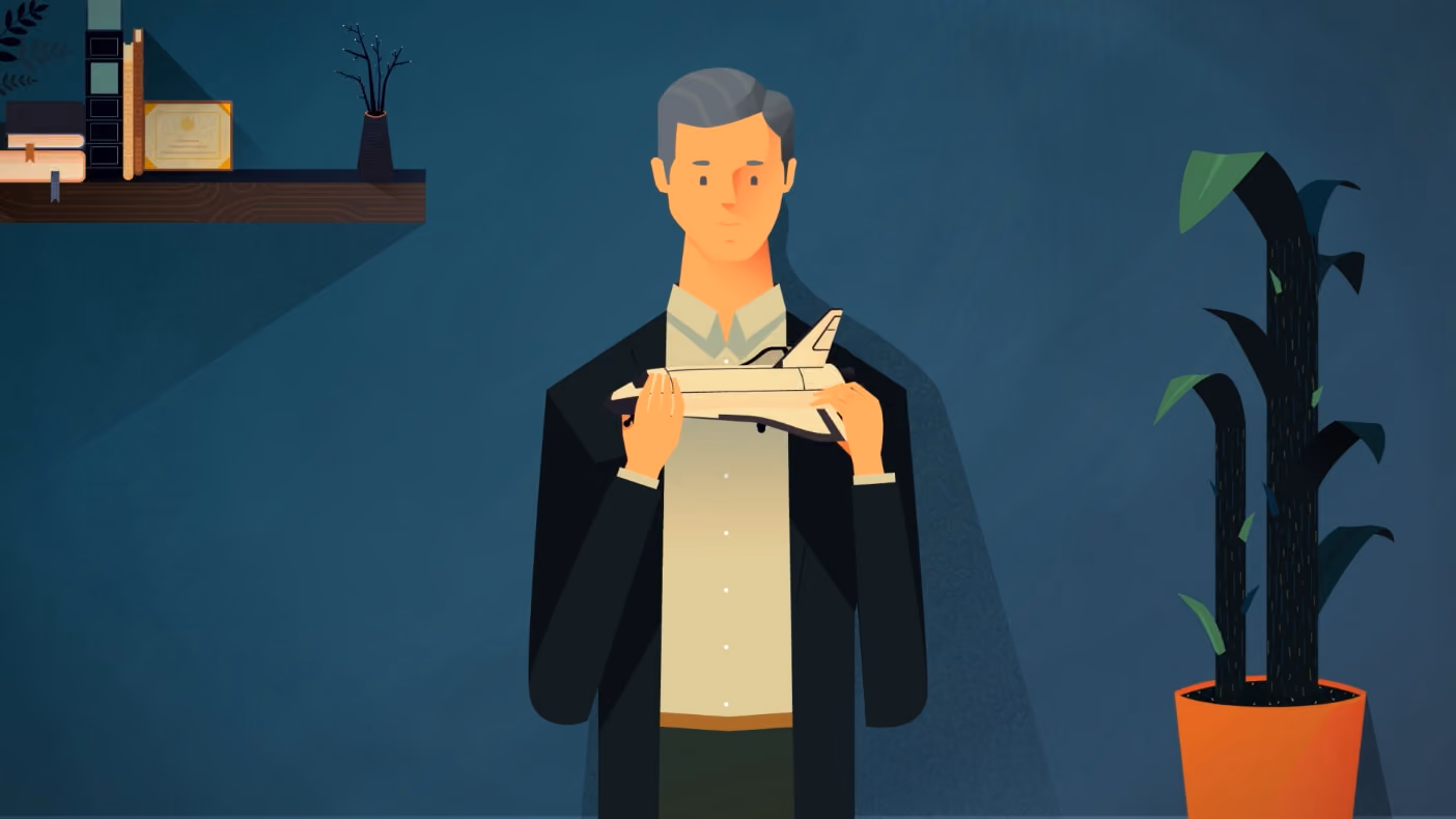 a man holding a piece of paper in his hands