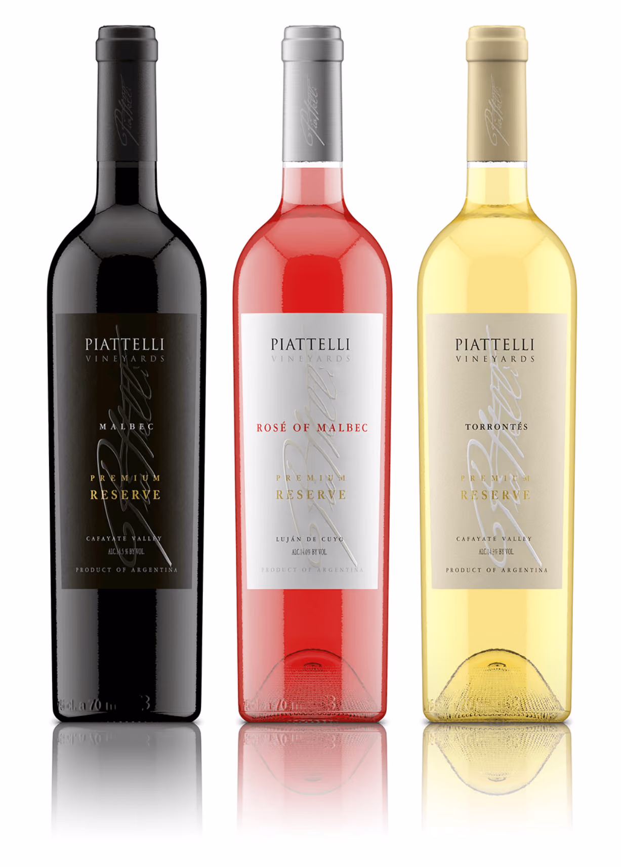 three bottles of wine sitting next to each other
