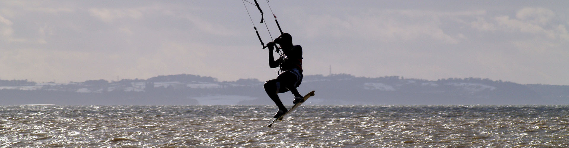 Person windsurfing on the sea