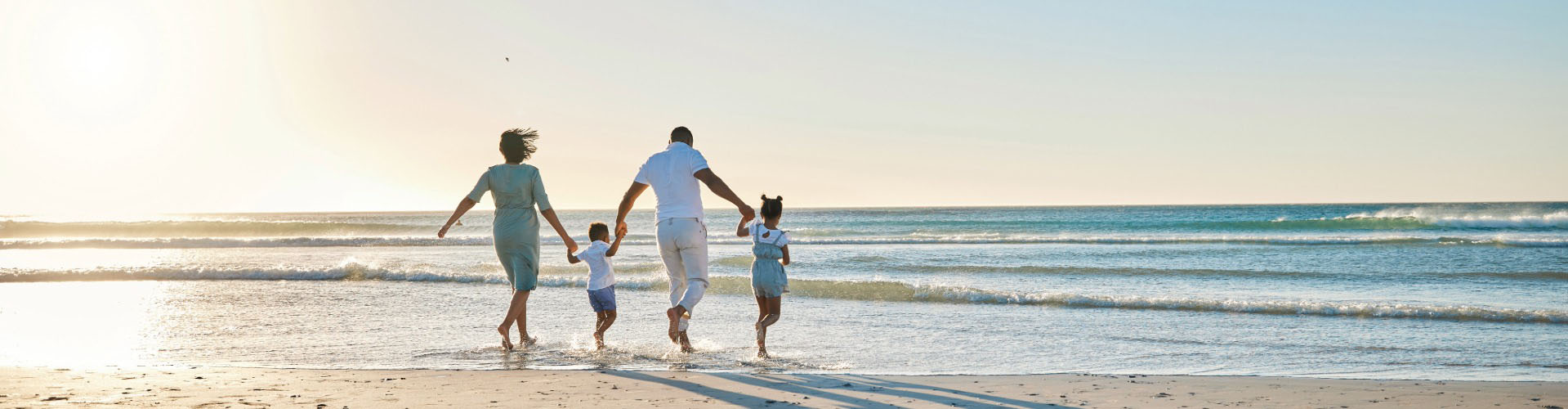 Family picture on a beach.