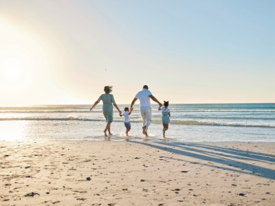 Family picture on a beach.
