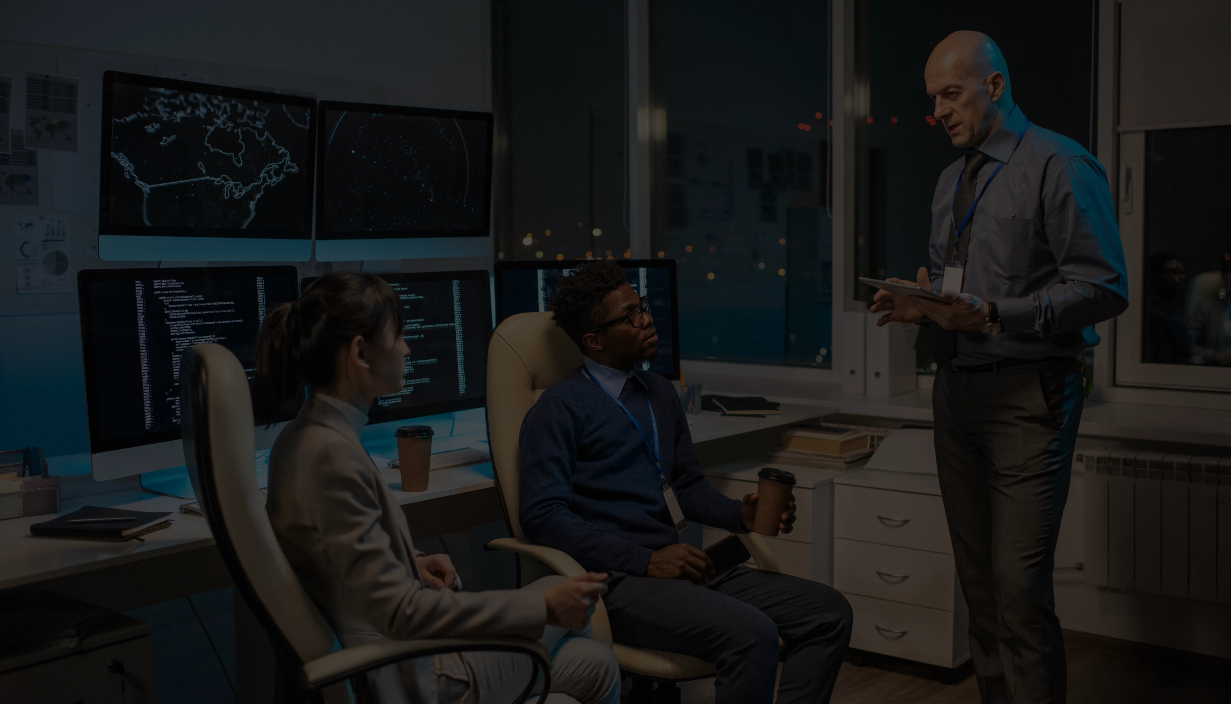 Savoya global operations team: Professional logistics coordinators managing executive ground transportation from a high-tech command center.