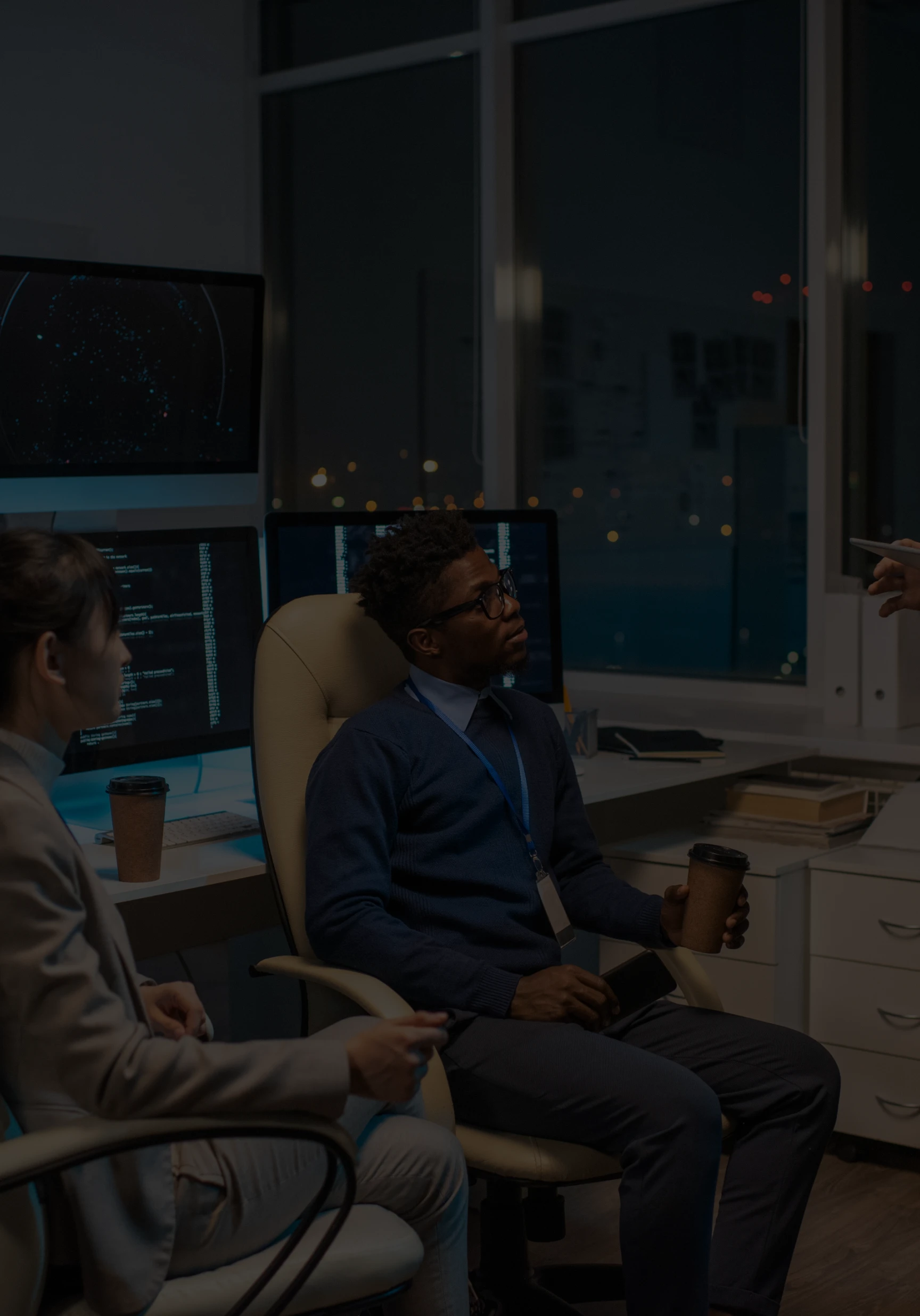 Savoya global operations team: Professional logistics coordinators managing executive ground transportation from a high-tech command center.