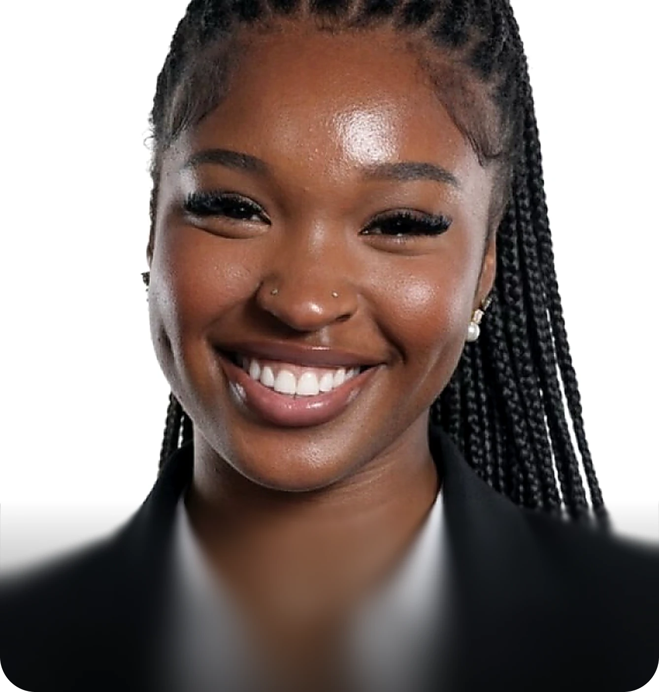 Professional headshot of a smiling woman with long braided hair, wearing a black blazer.