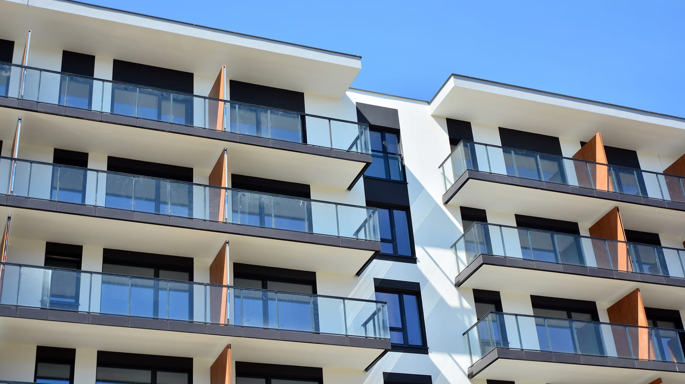 Multi-residential apartment building facade with extensive glazing and balconies
