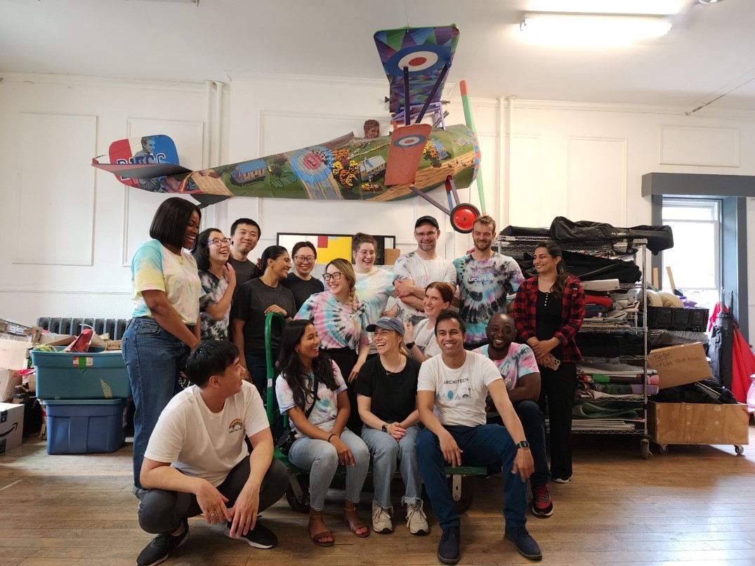 A group of people posing for a photoAI-generated content may be incorrect., Picture