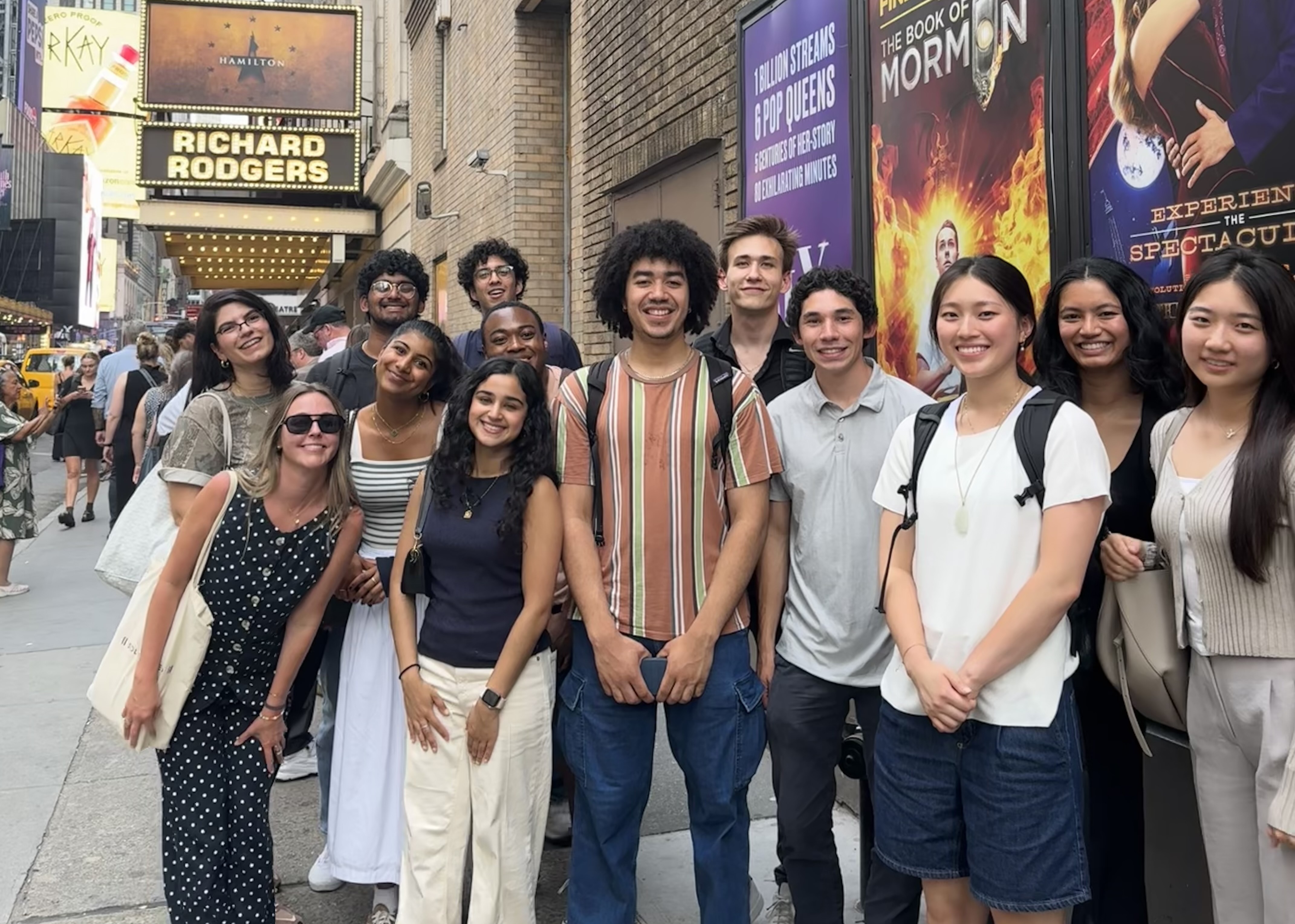 Photo of Viam interns smiling in front of Richard Rodgers theater before seeing Hamilton on Broadway