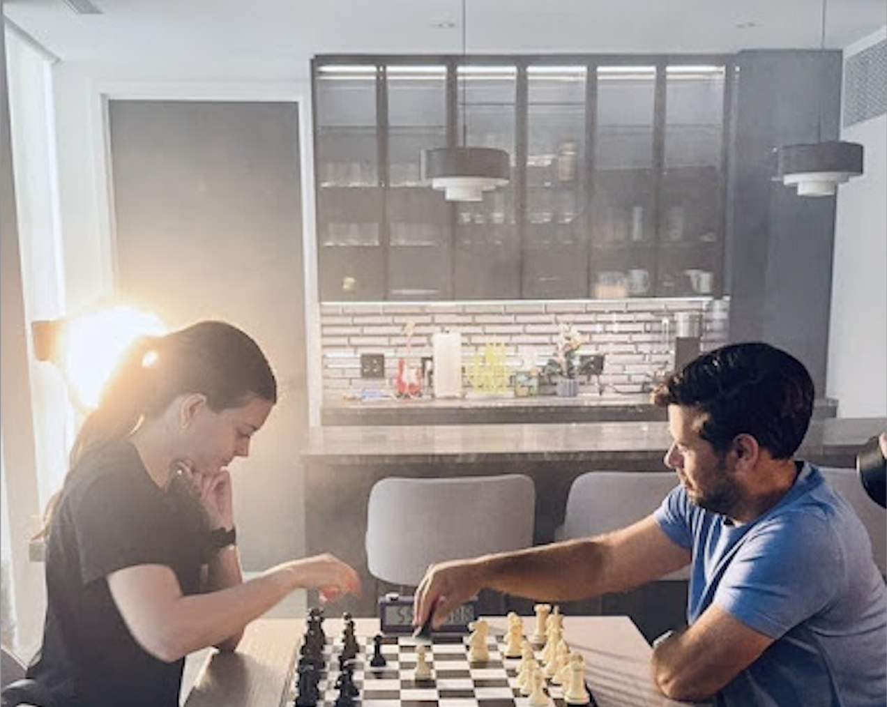 Gambit Co-founders Eliot and Nicole playing chess