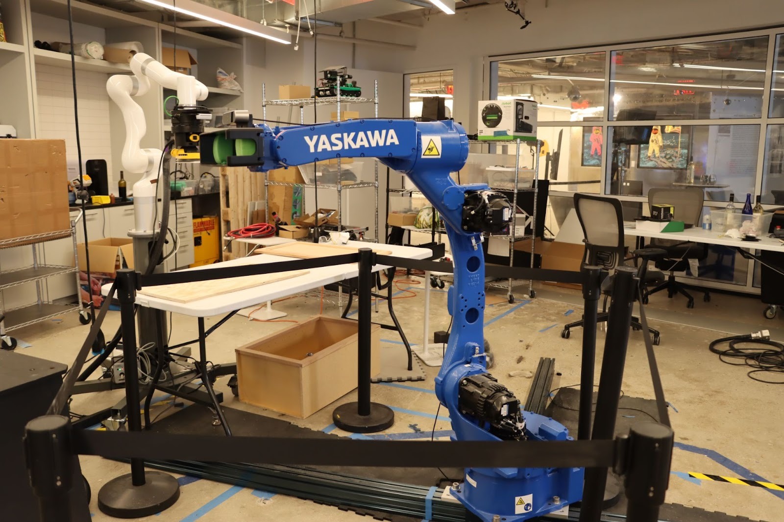 Yaskawa arm on the floor in Viam's lab.
