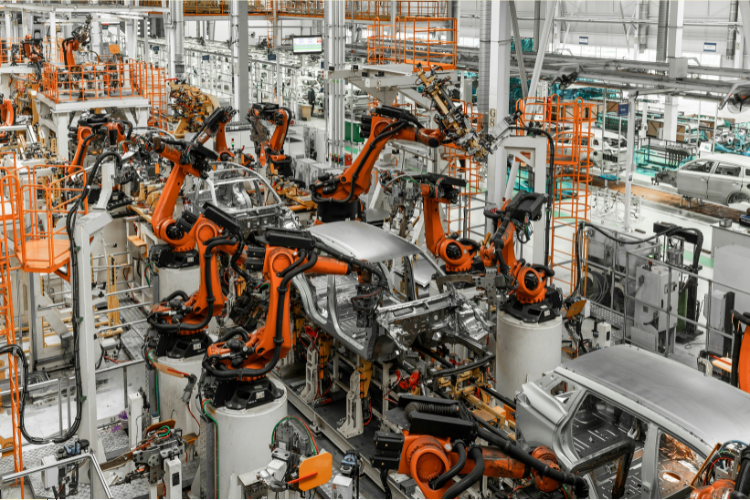 Industrial robots on manufacturing floor