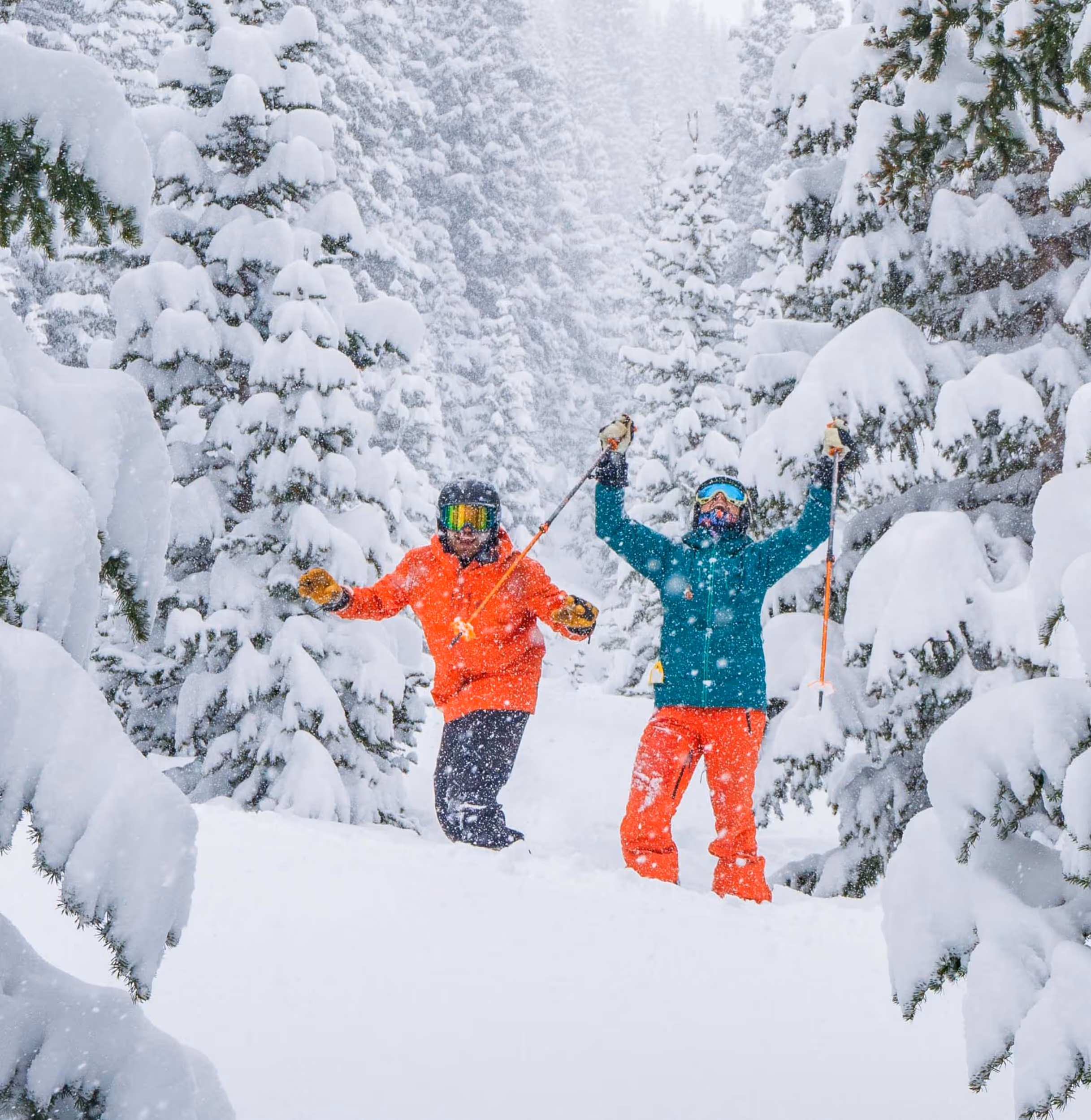 Some brightly dressed skiers frolicking in the snow at Winter Park