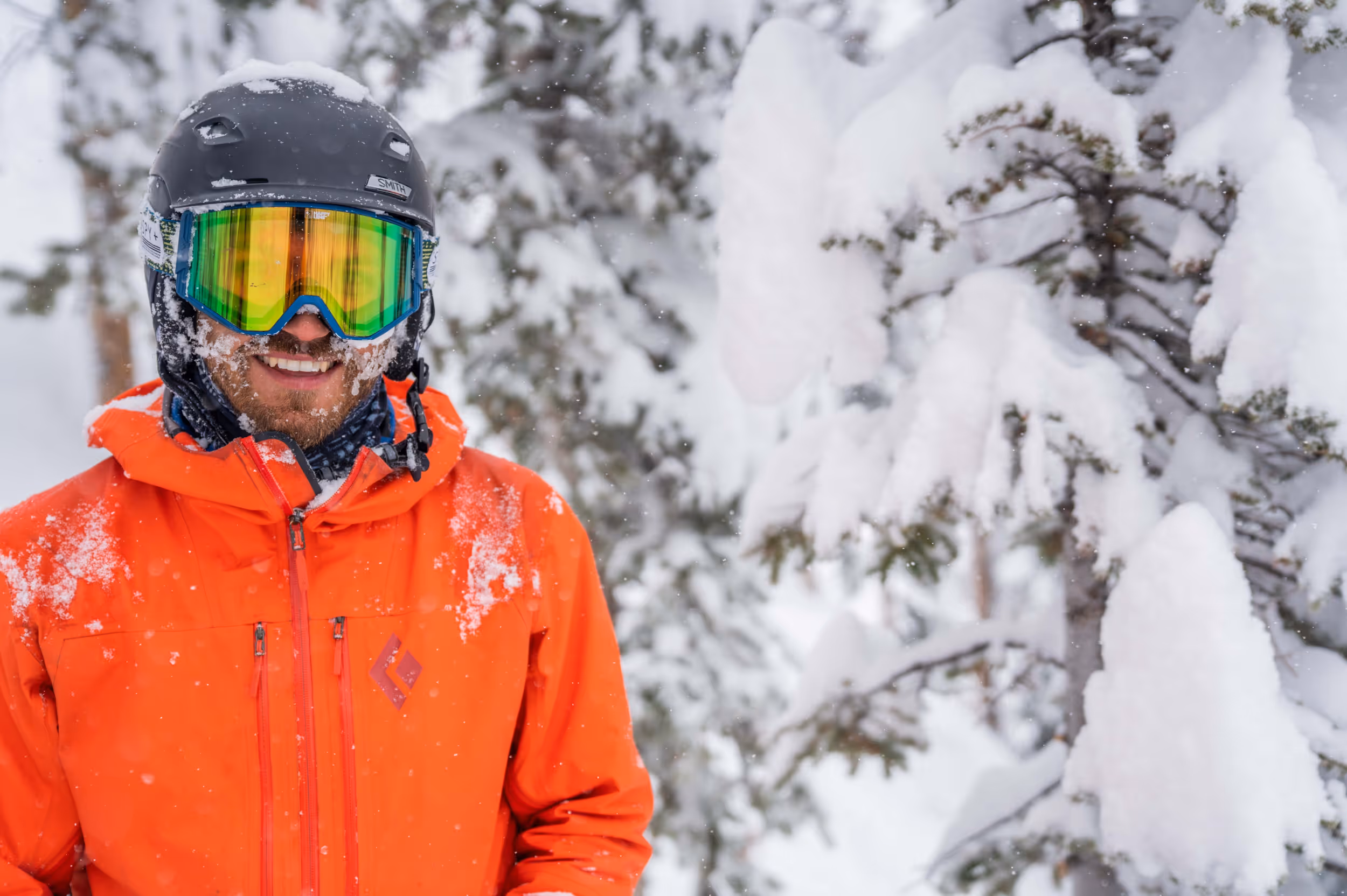 A stoked skier enjoying the snow at Winter Park