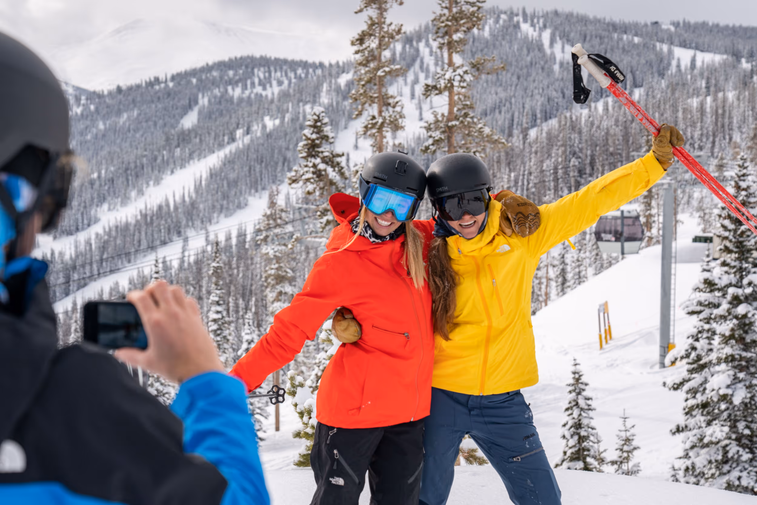Some stoked skiers posing for a photo at Winter Park 