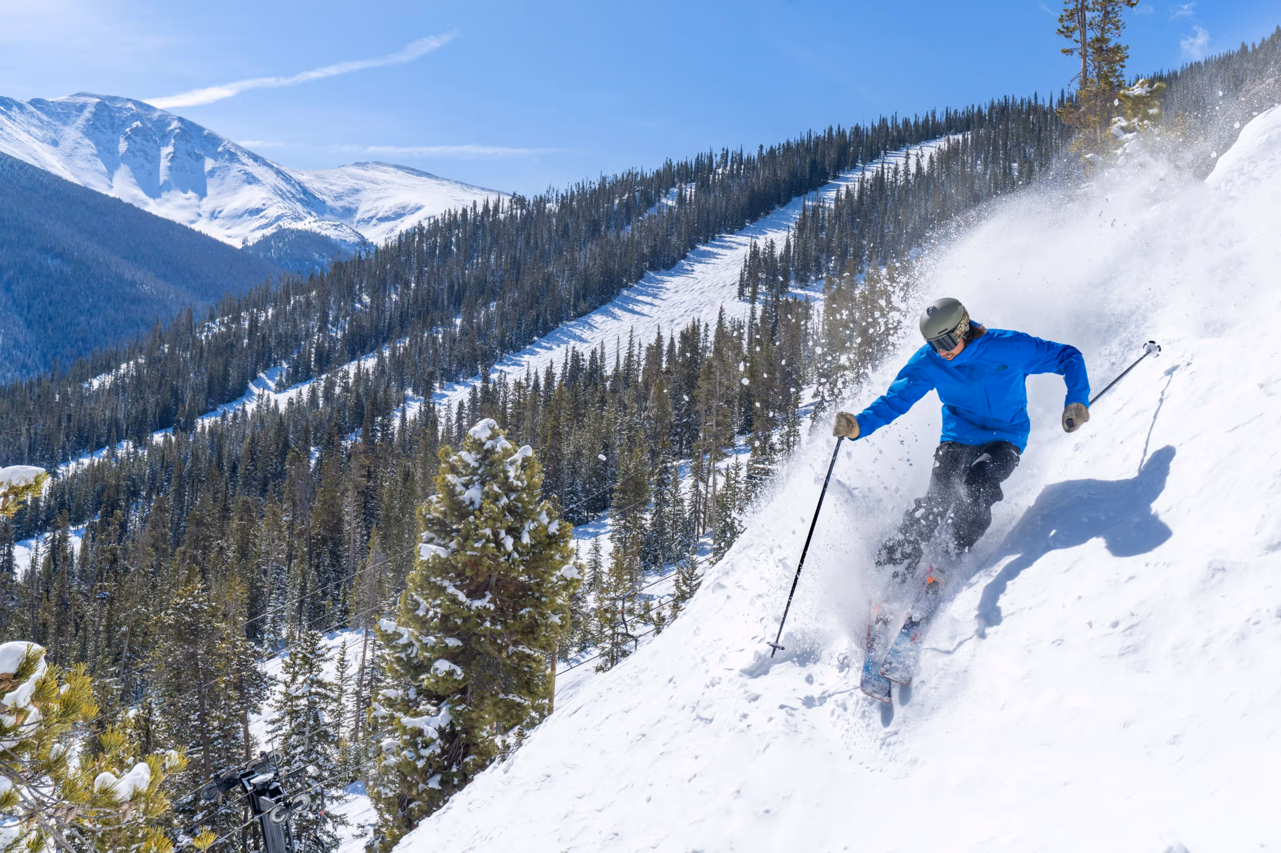 A skier getting some POW turns at Winter Park