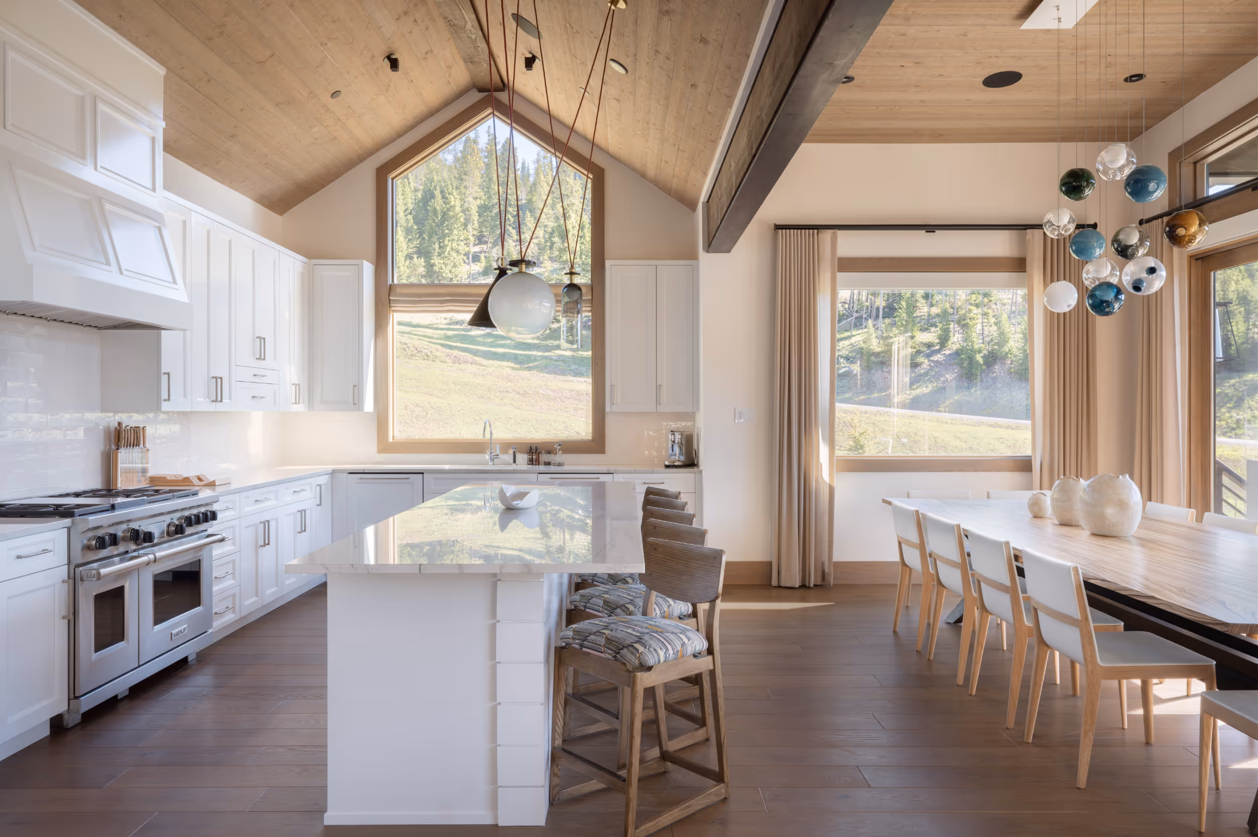 A well lit kitchen with modern amenities and a luxury feel 