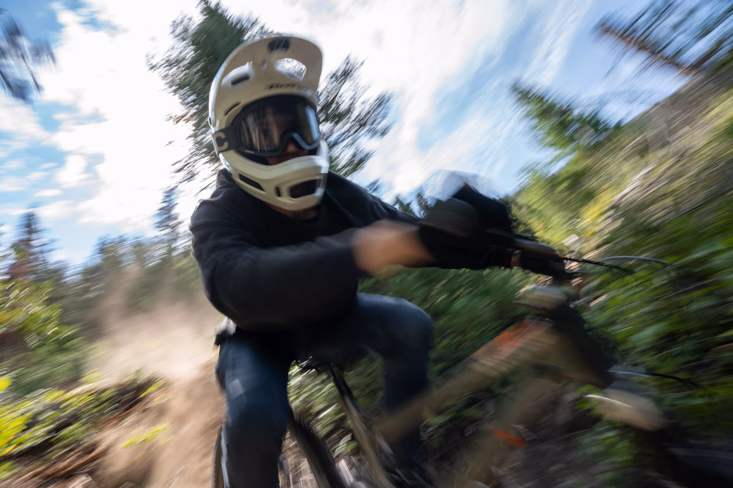 Blurry close up of mountain biker