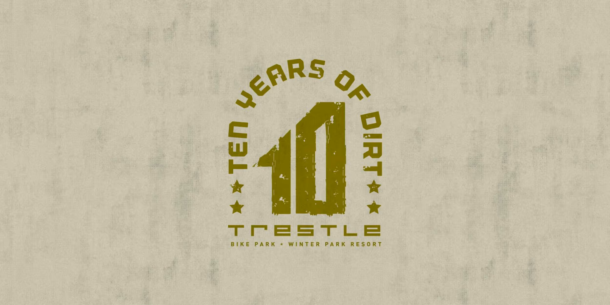 A digital ad for printed material or apparel showing " Trestle: ten years of dirt"