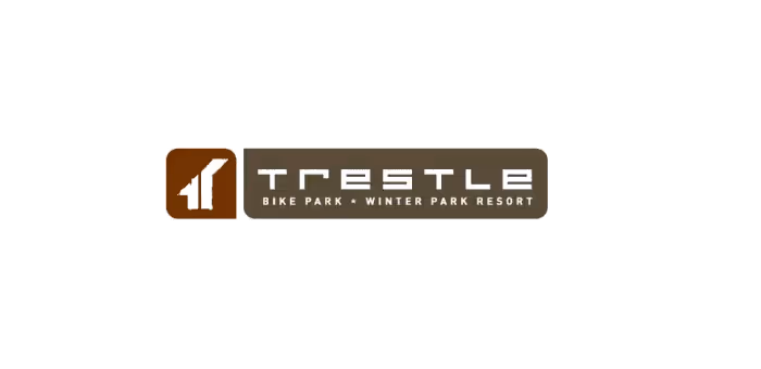 Trestle Bike Park logo with an orange accented t 
