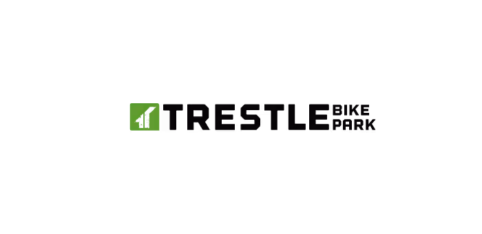 Trestle Bike Park logo with a green accented t