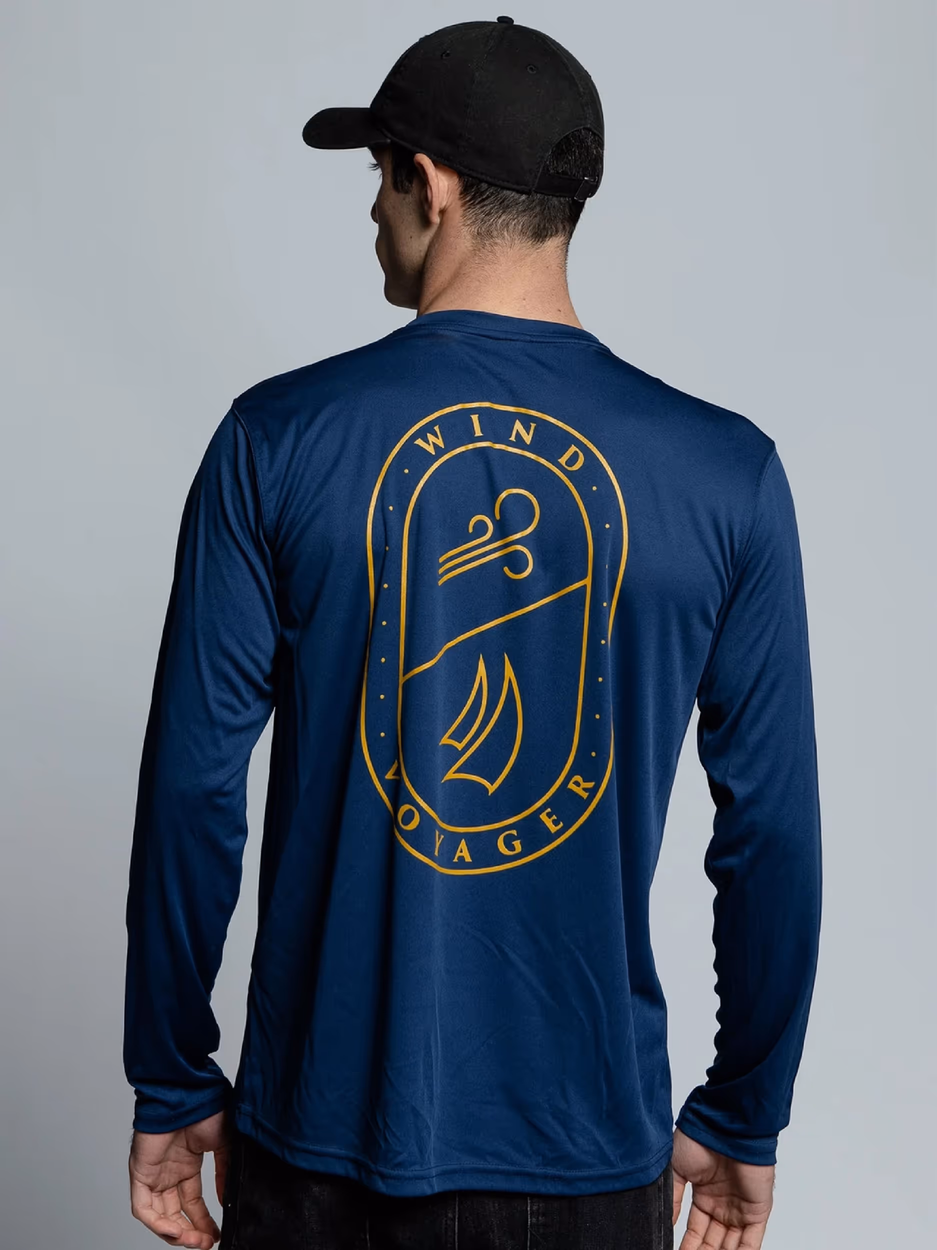 Man wearing dark blue wind voyager sun shirt 