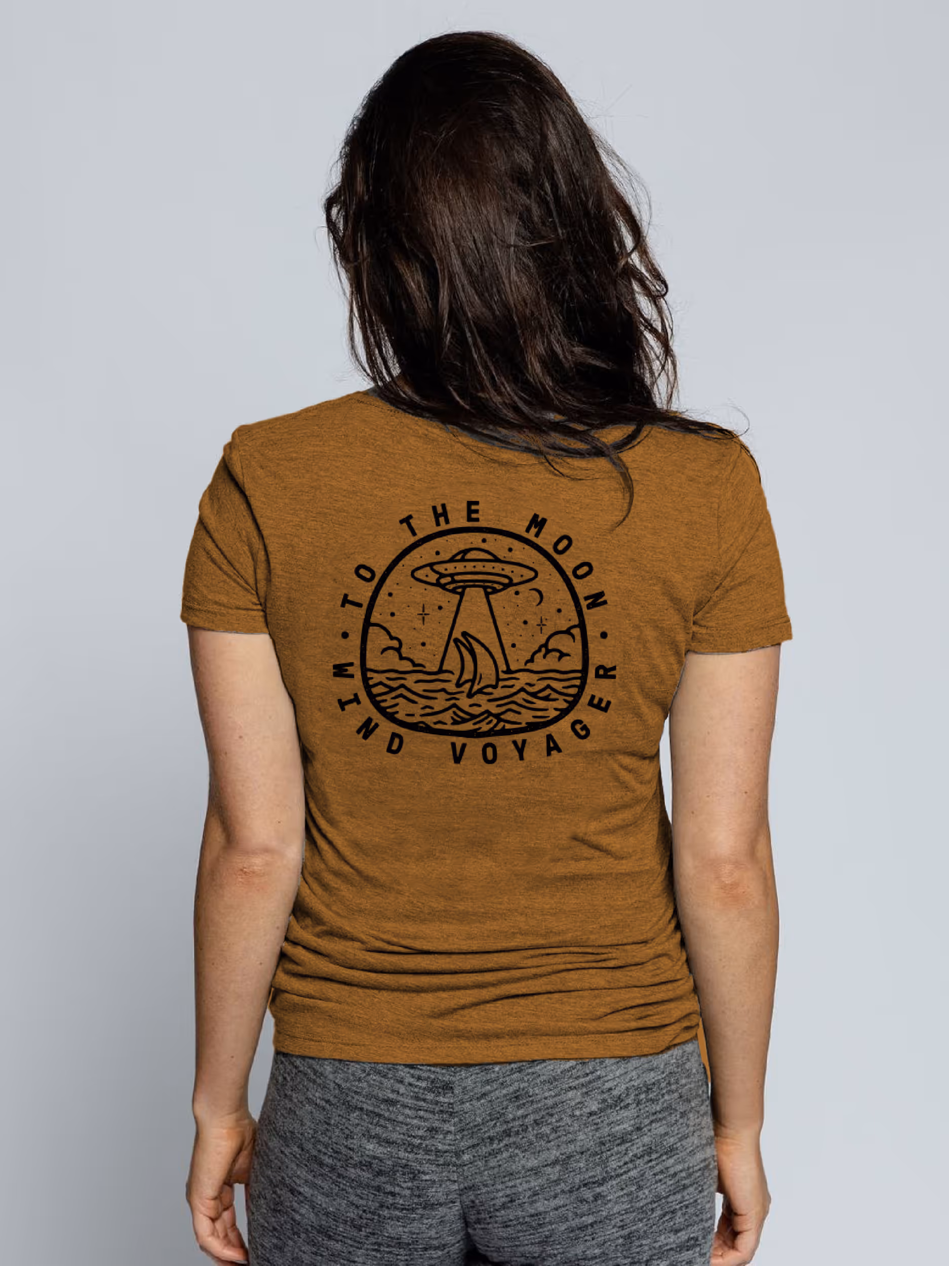 Woman wearing UFO Wind Voyager tshirt