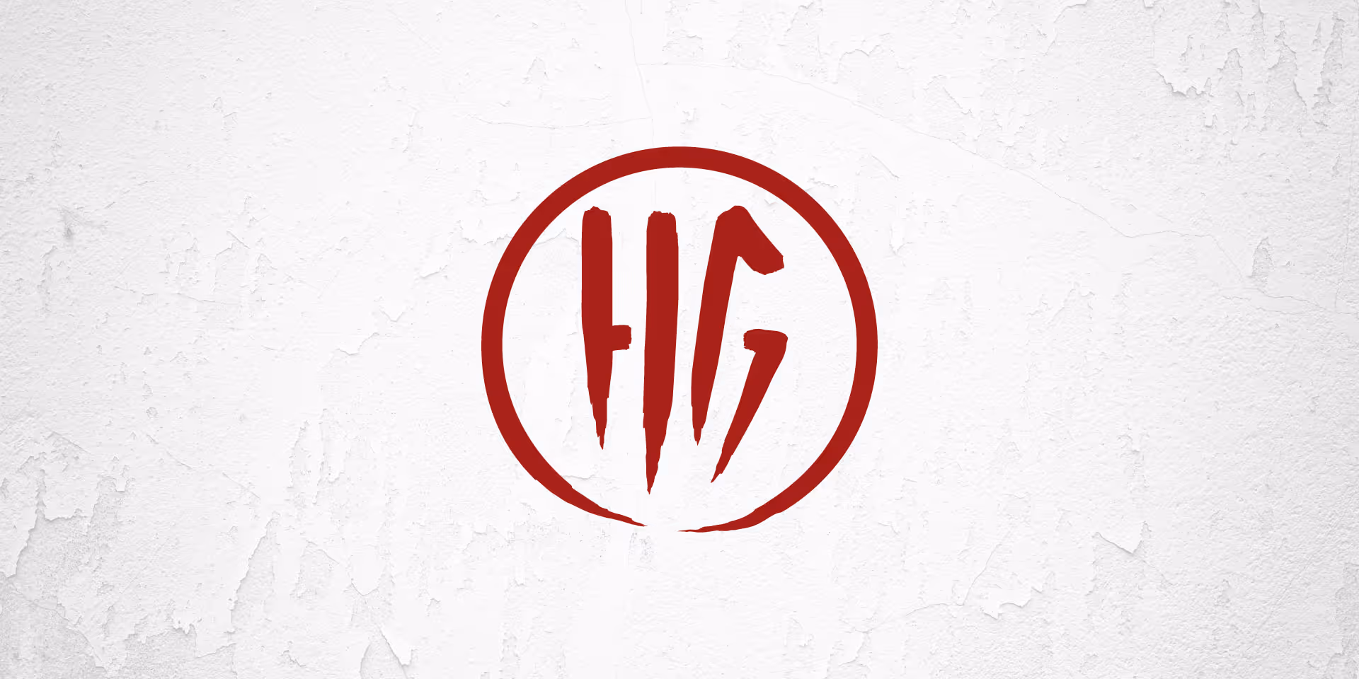 A white and red HG ski logo