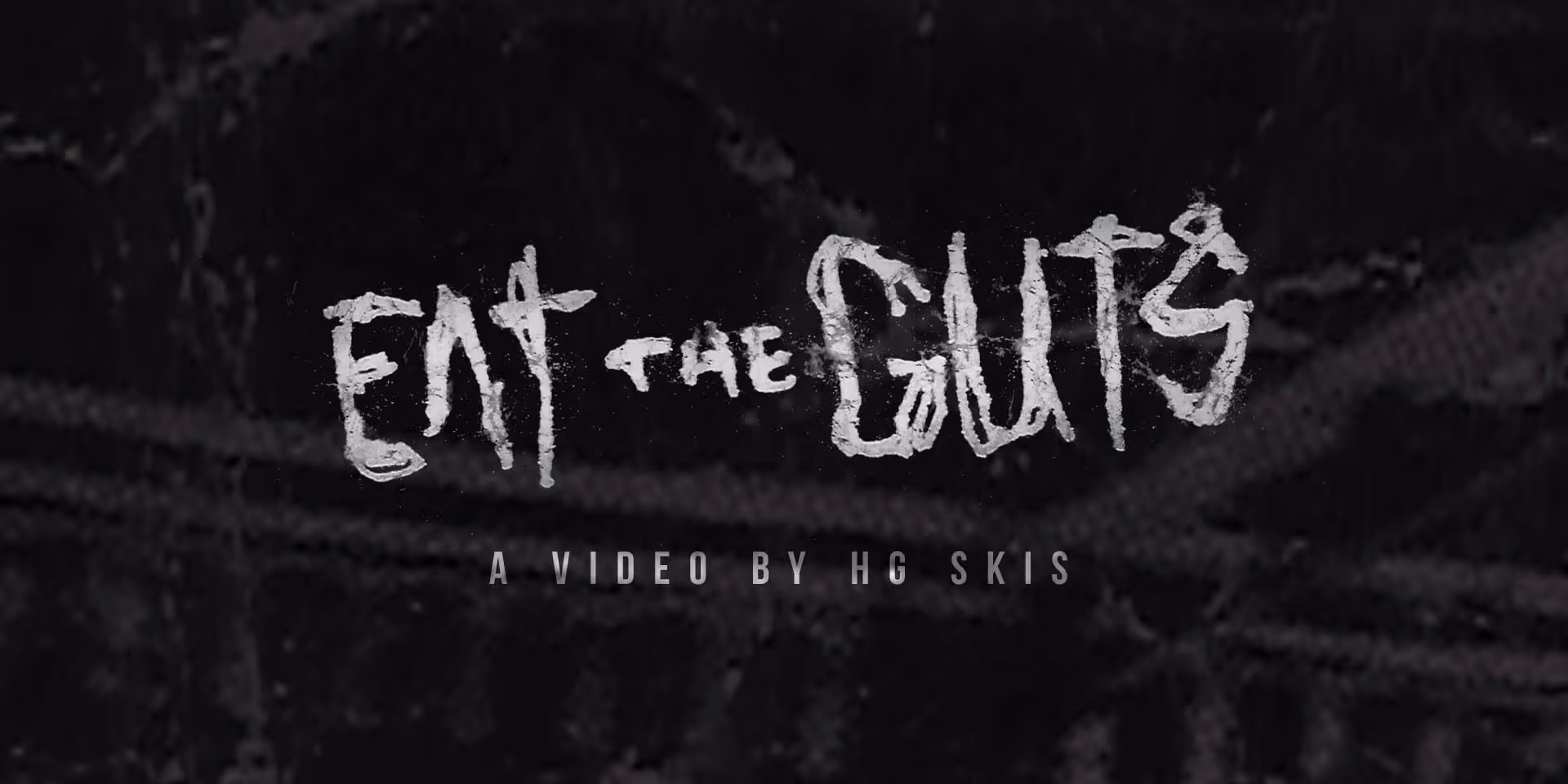 A dark colored graphic that reads "Eat the Guts"