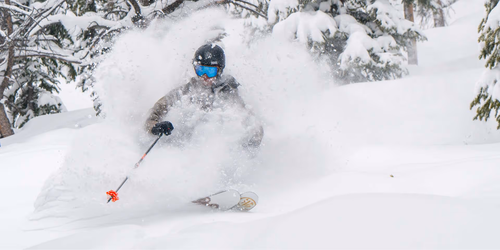 A skier is enjoying some face shots on the new HG skis 