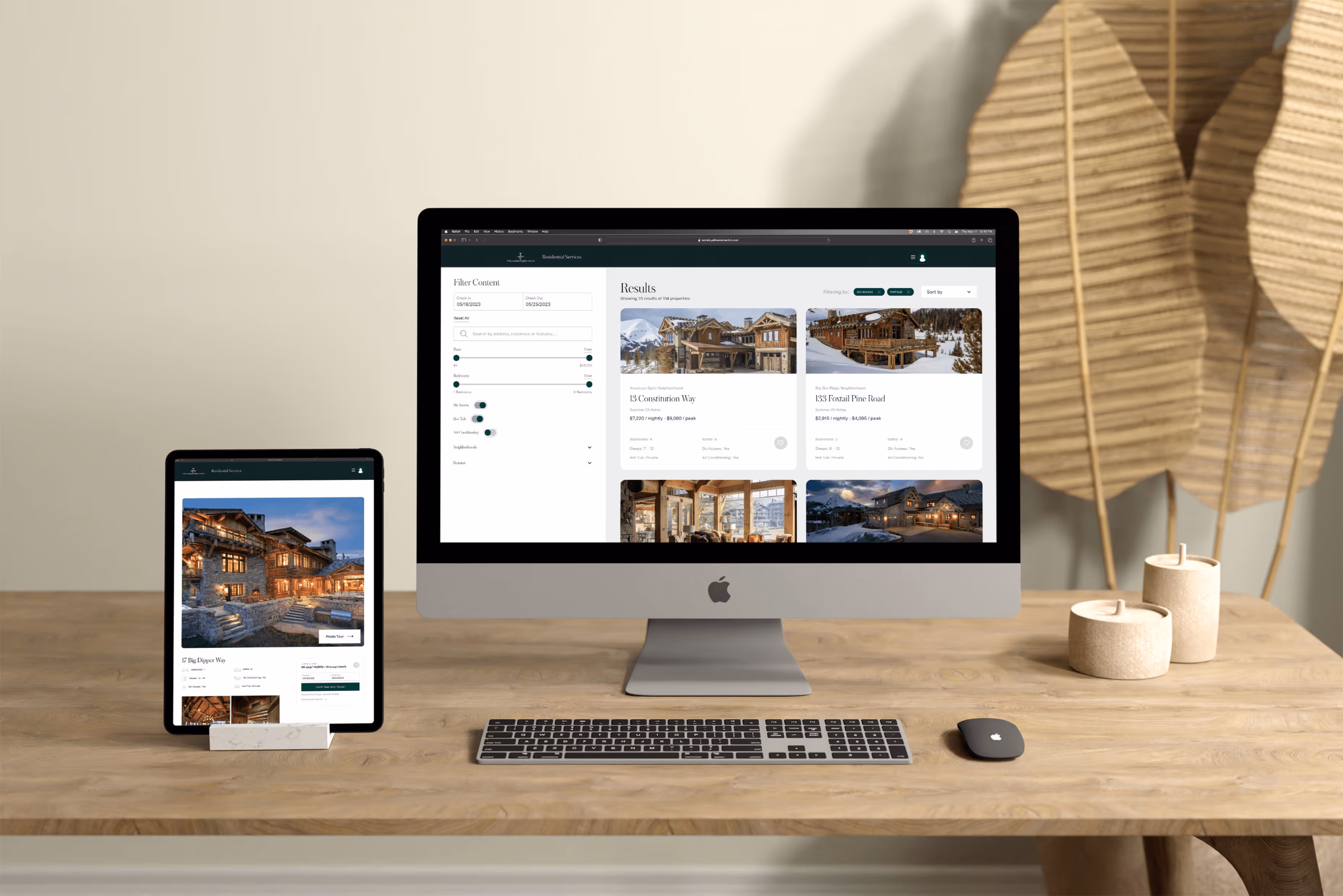 A laptop and tablet next to each other showing some architectural photos from Charles Stemen Studio and how they are utilized on the Yellowstone Club's website on different screen sizes. 