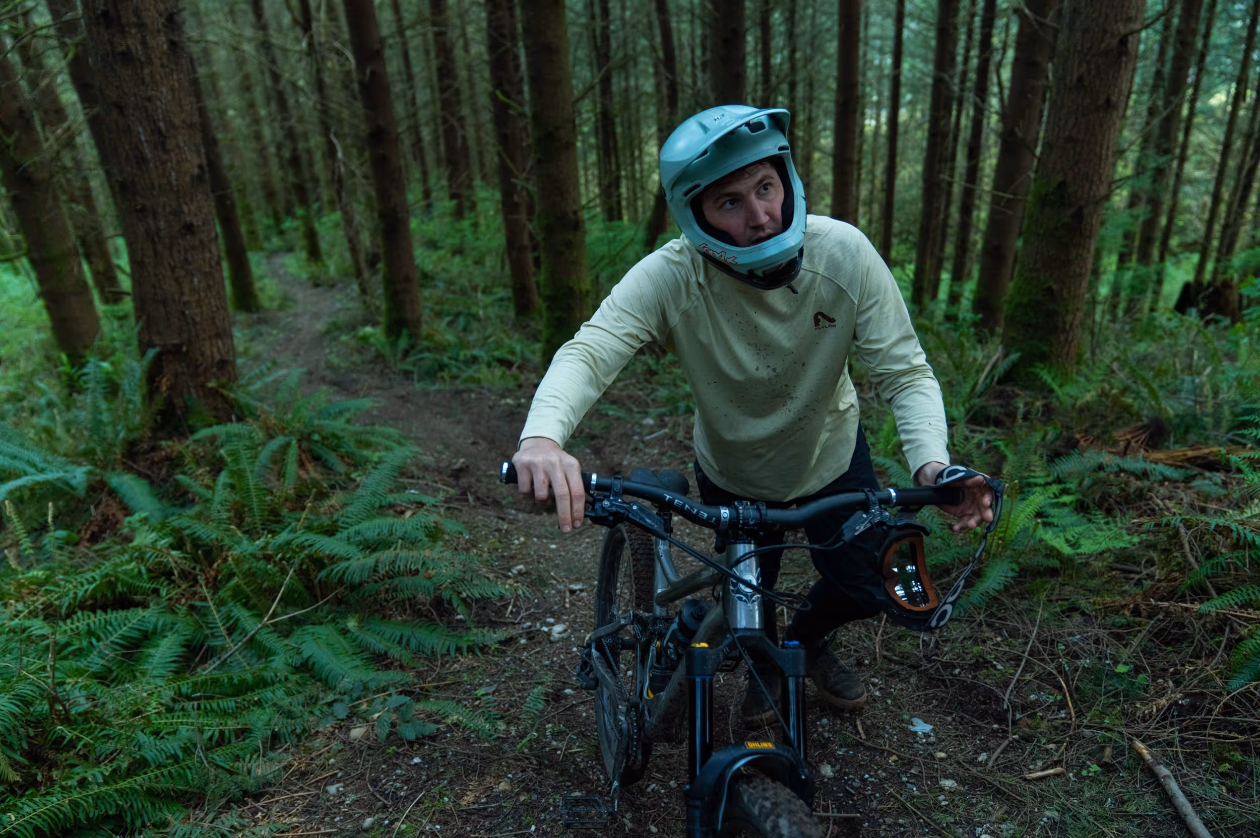 A mountain biker taking a quick break on the trail 