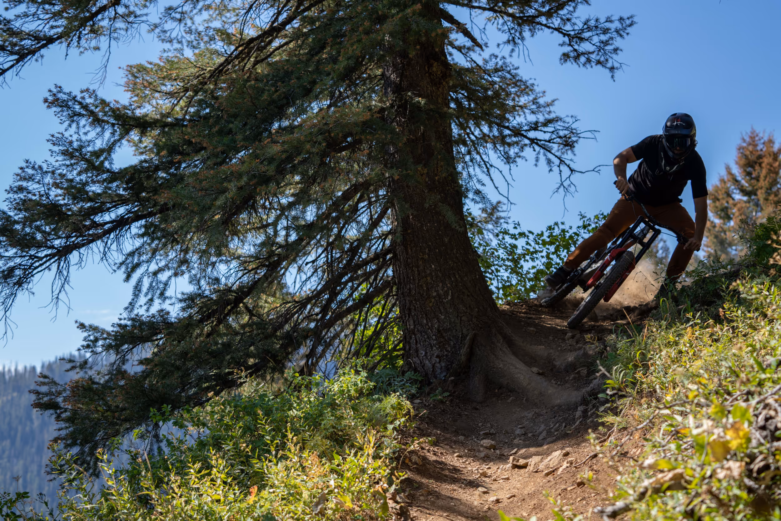 A mountain biker hitting a berm