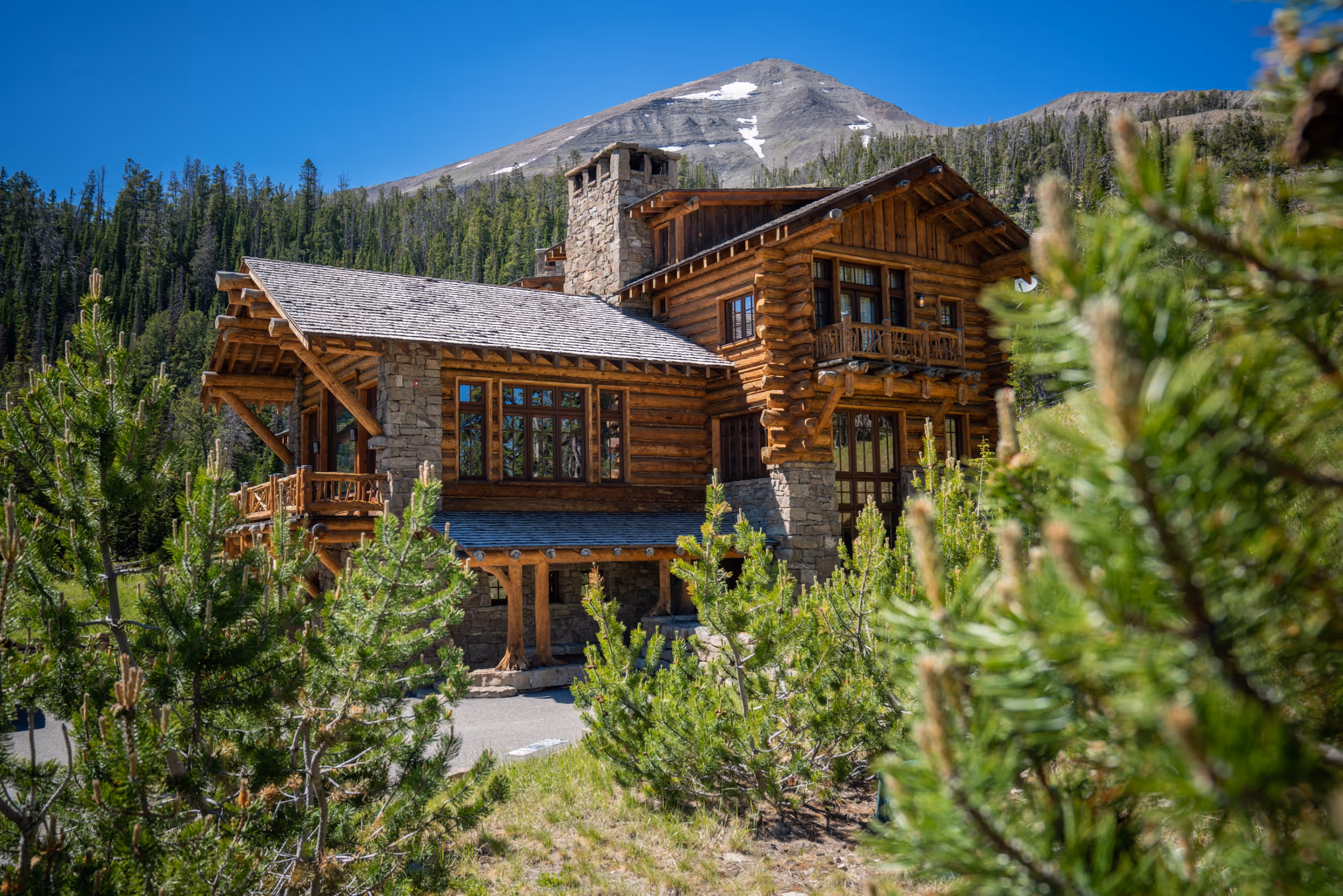 A luxurious log cabin nestled in the forest 