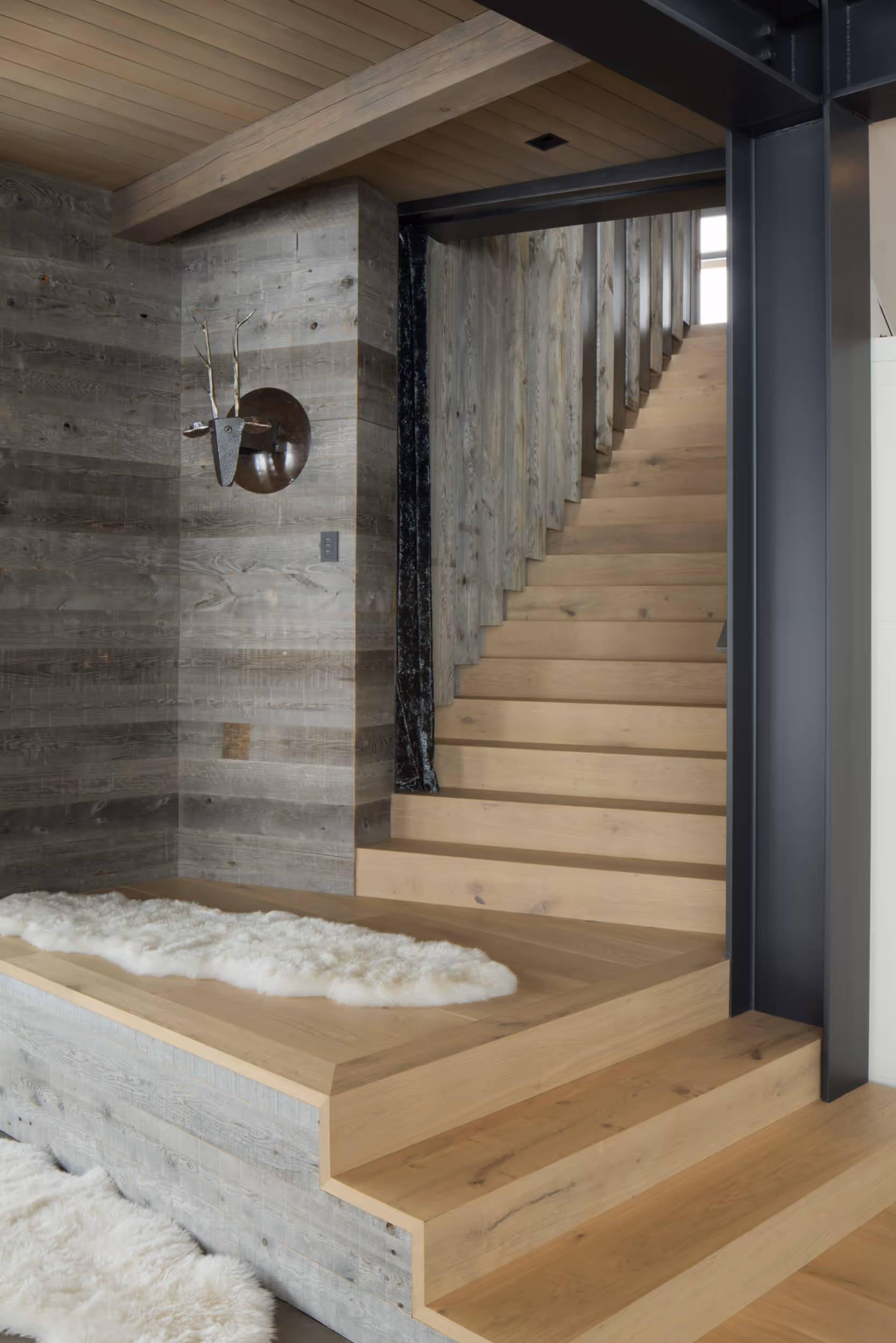 A luxurious modern stairwell with a mountainous twist