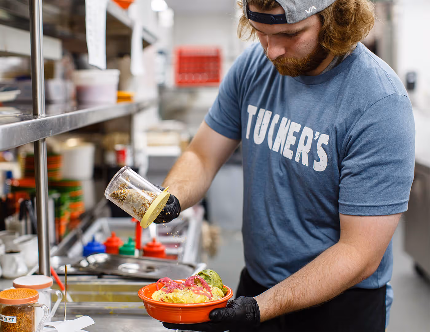 Male chef preparing dish